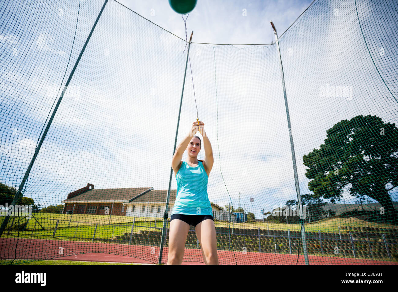 Athlete performing a hammer throw Stock Photo