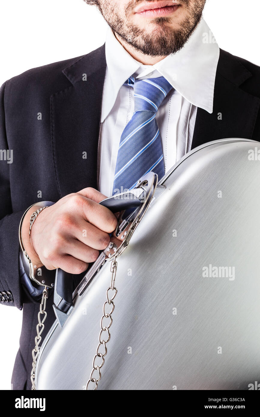 Businessman wearing a suit with a secure suitcase attached with