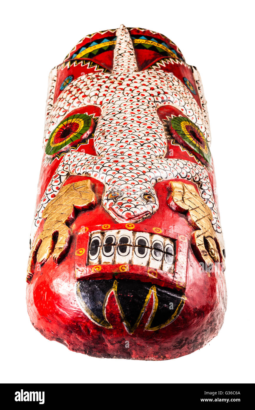 an ancient big witchdoctor tribal mask isolated over a white background Stock Photo