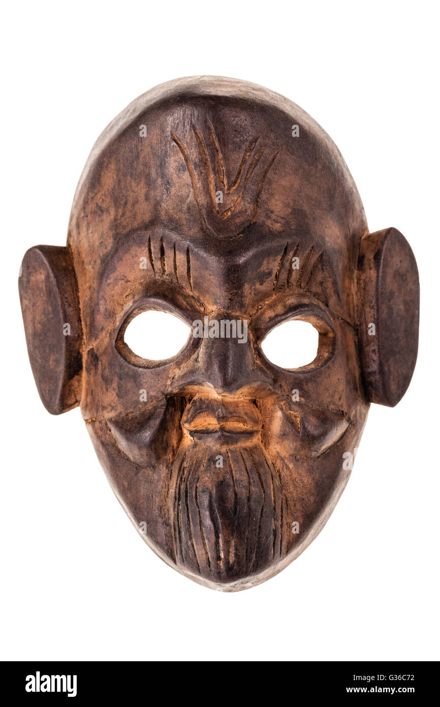 an ancient wooden mask isolated over a white background Stock Photo Alamy