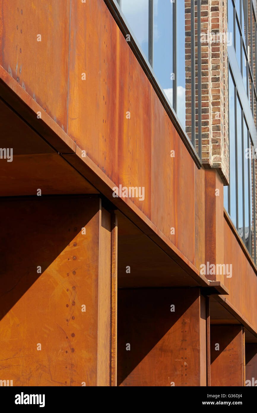 Detail of Corten steel colonnade. Commodity Quay, London, United Kingdom. Architect: BuckleyGrayYeoman, 2014. Stock Photo