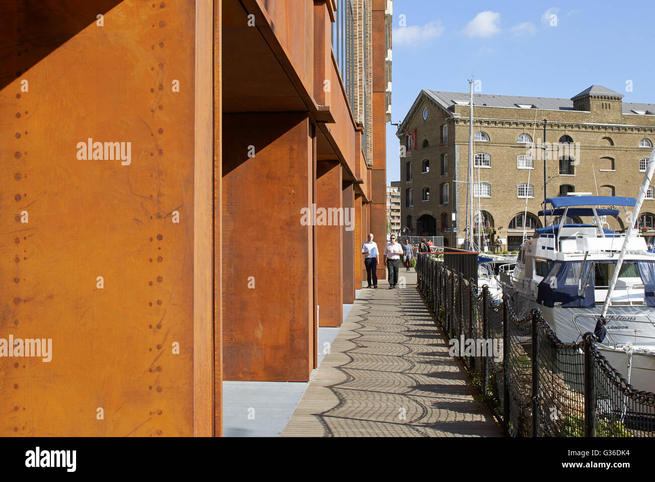 Corten steel cladding of colonnade. Commodity Quay, London, United Kingdom. Architect: BuckleyGrayYeoman, 2014. Stock Photo