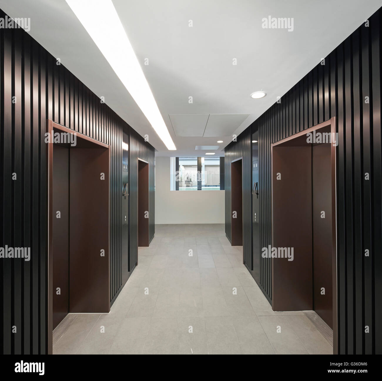 Elevator waiting area. Commodity Quay, London, United Kingdom. Architect: BuckleyGrayYeoman, 2014. Stock Photo