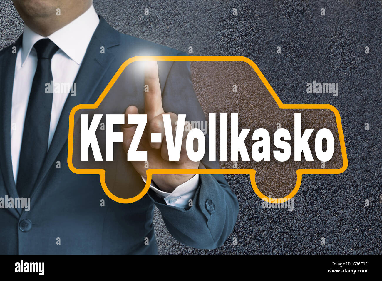 kfz vollkasko (in german car fully comprehensive) car touchscreen is operated by businessman concept. Stock Photo