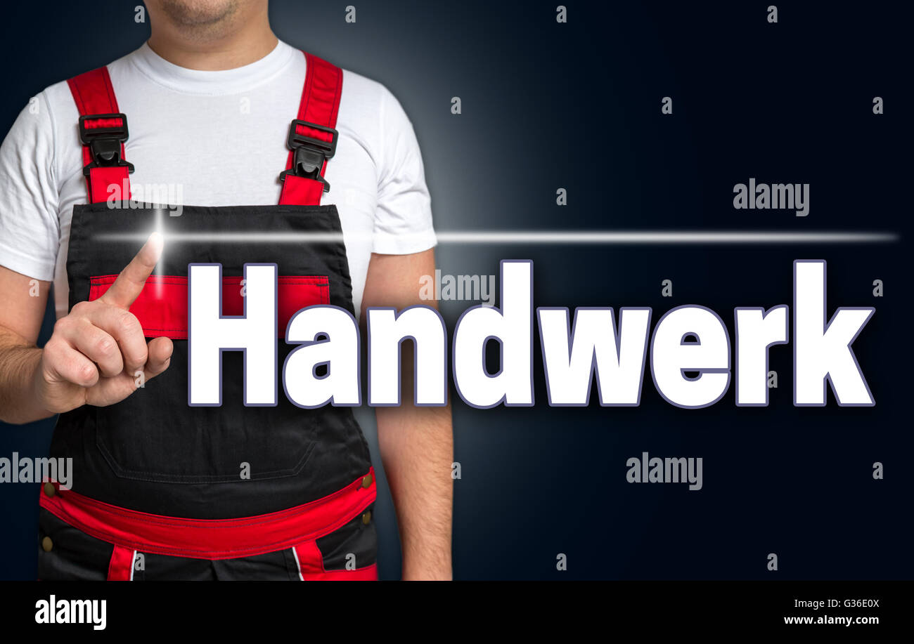 handwerk (in german craft) touchscreen is shown by the craftsman. Stock Photo