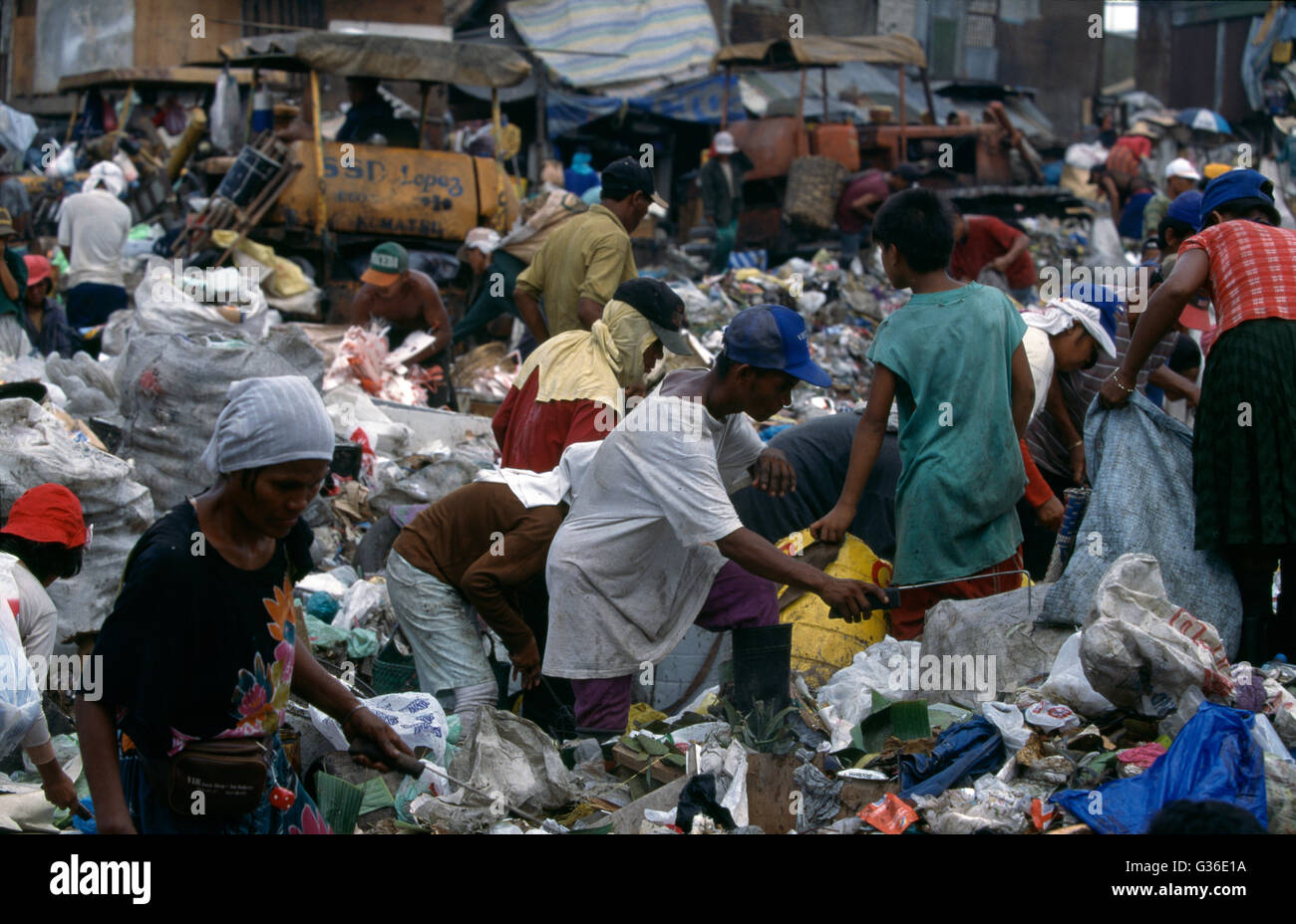Tondo Squatters Rummaging Through Garbage Heap, Manila, Philippines Stock Photo