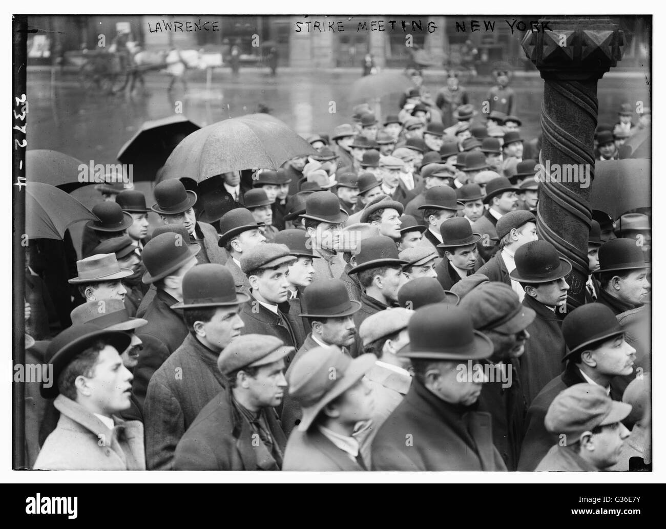 Men gather in New York City to listen to speeches in support of the Lawrence, Massachusetts Textile Strike. Stock Photo