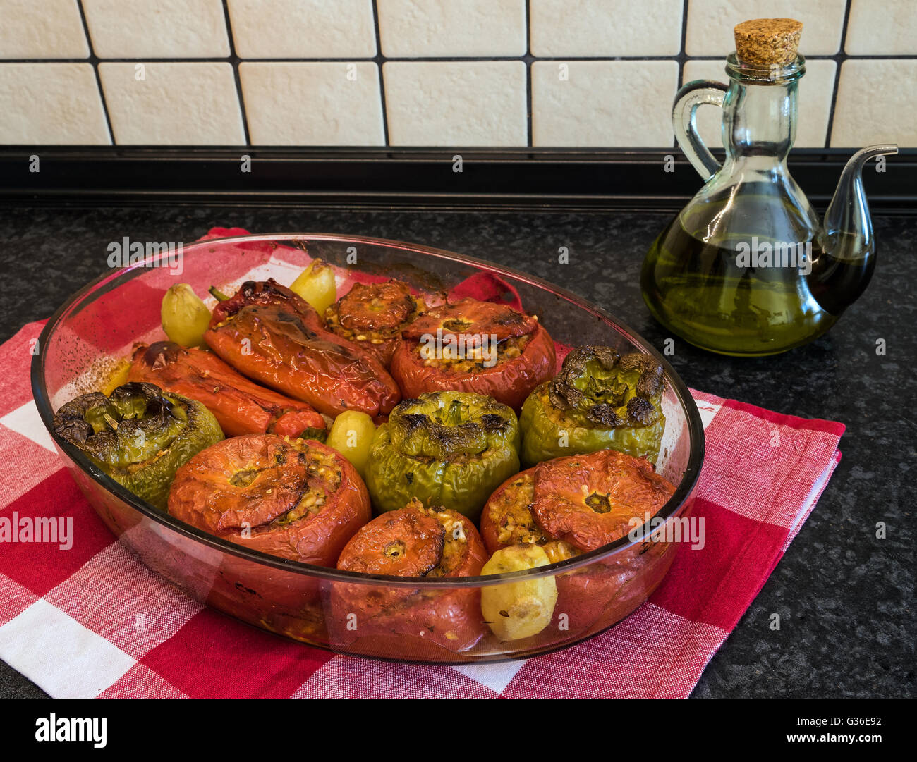 Stuffed tomatoes and peppers, a traditional plate in Greece Stock Photo