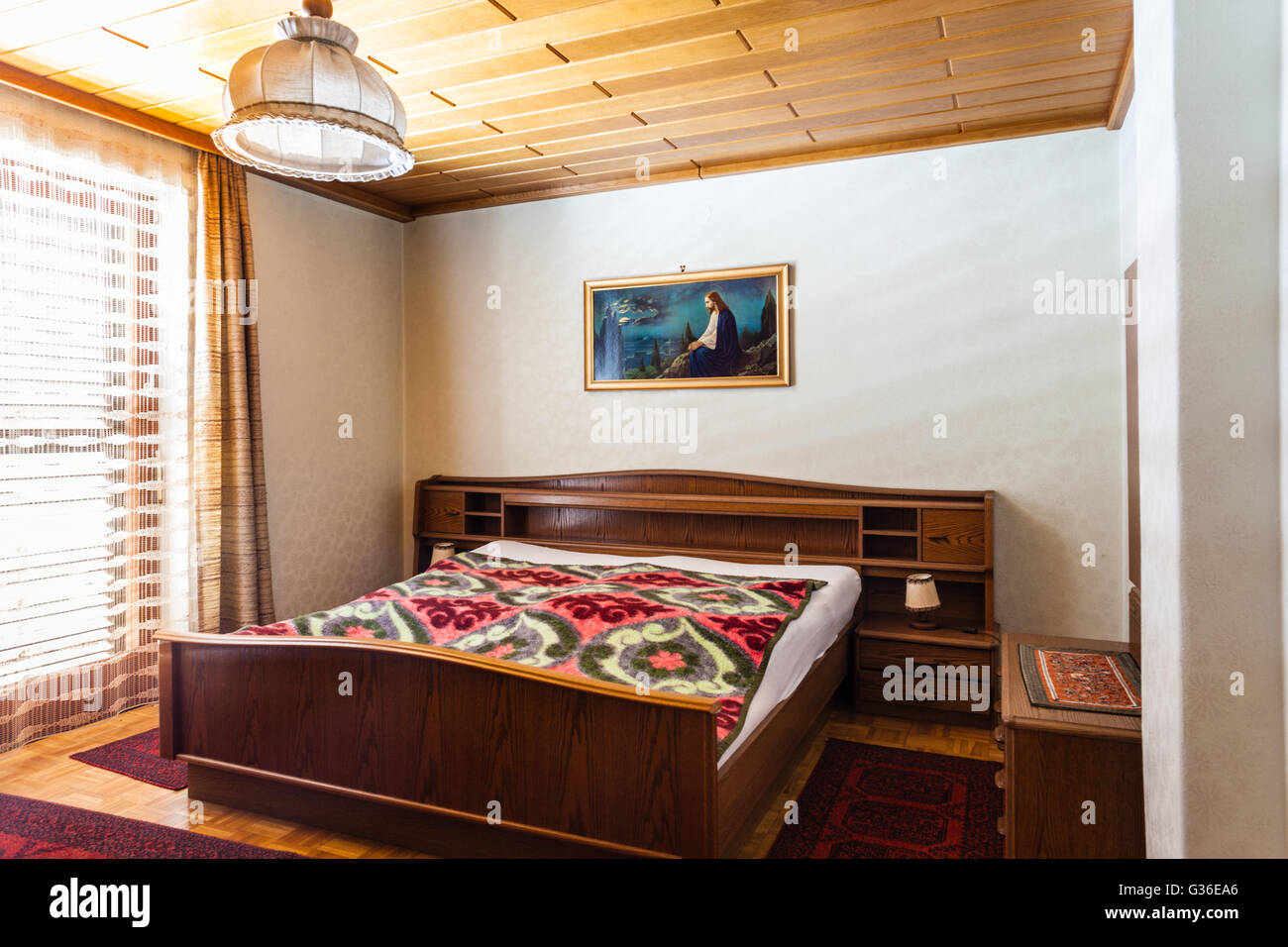 a bedroom with old furniture that should be renovated Stock Photo - Alamy
