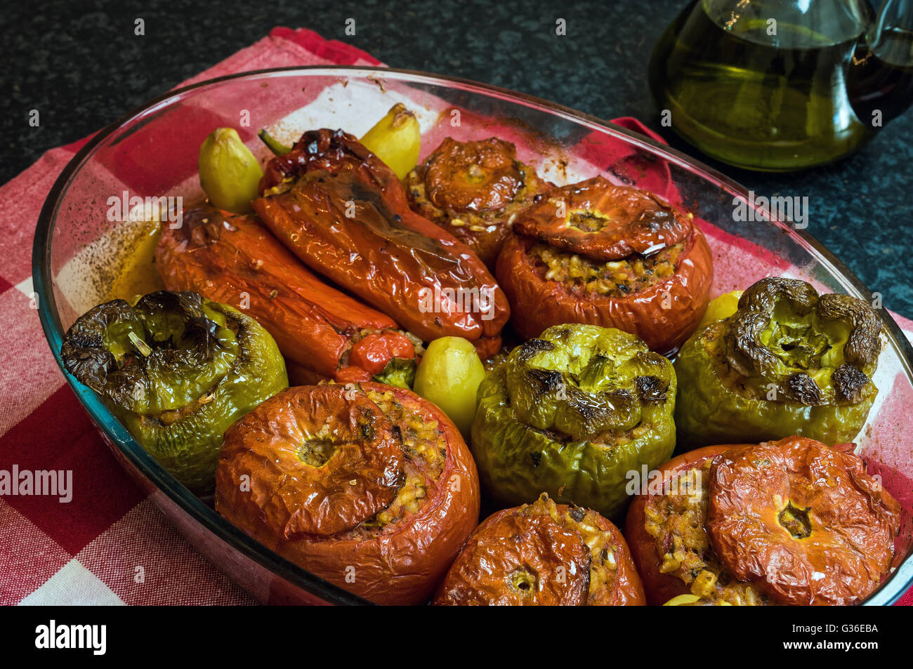 Stuffed tomatoes and peppers, a traditional plate in Greece Stock Photo