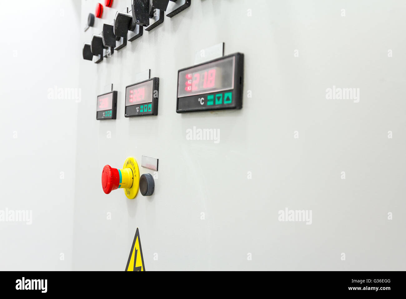 Electrical control panel containing has a digital temperature gauge