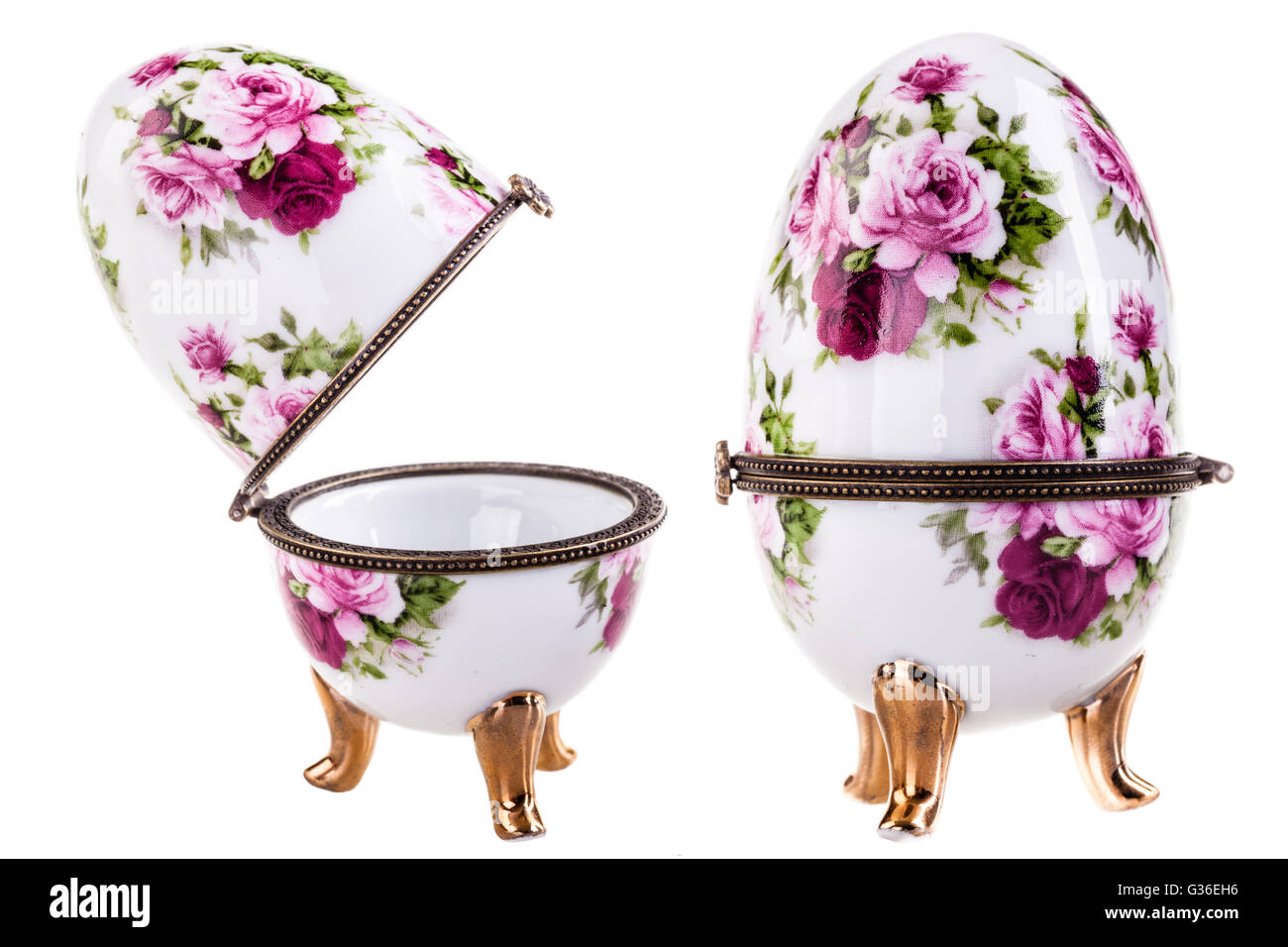 a porcelain faberge style decorated egg isolated over a white