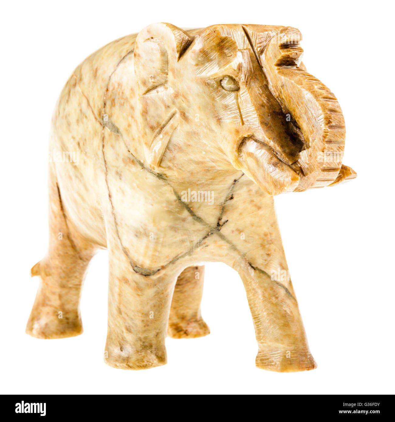 a stone elephant figurine isolated over a white background Stock Photo ...