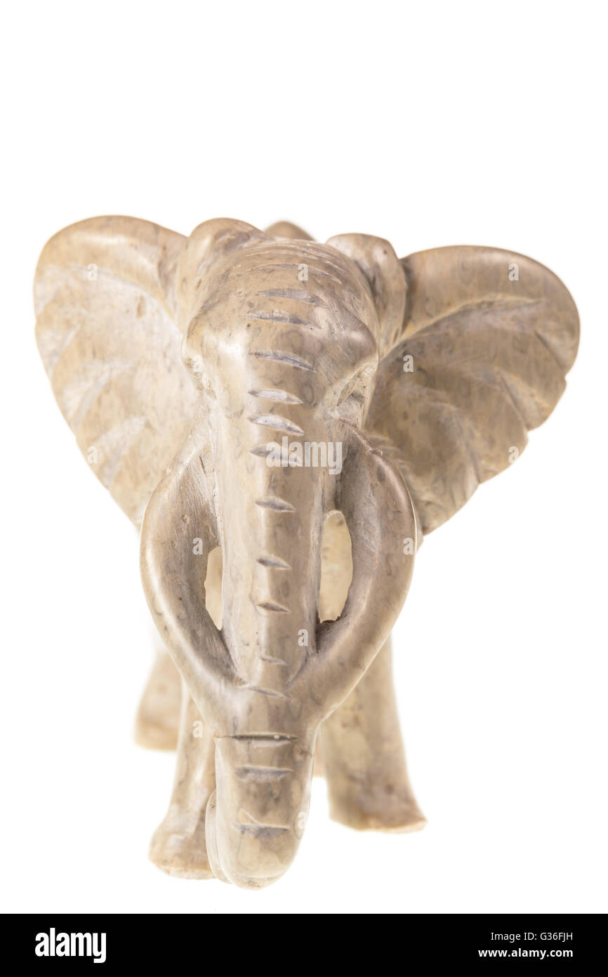 a stone elephant figurine isolated over a white background Stock Photo ...