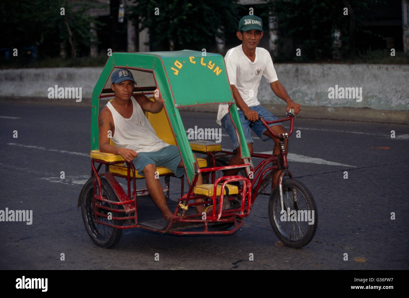 Bicycle With Sidecar and Passenger, Manila, Philippines Stock Photo