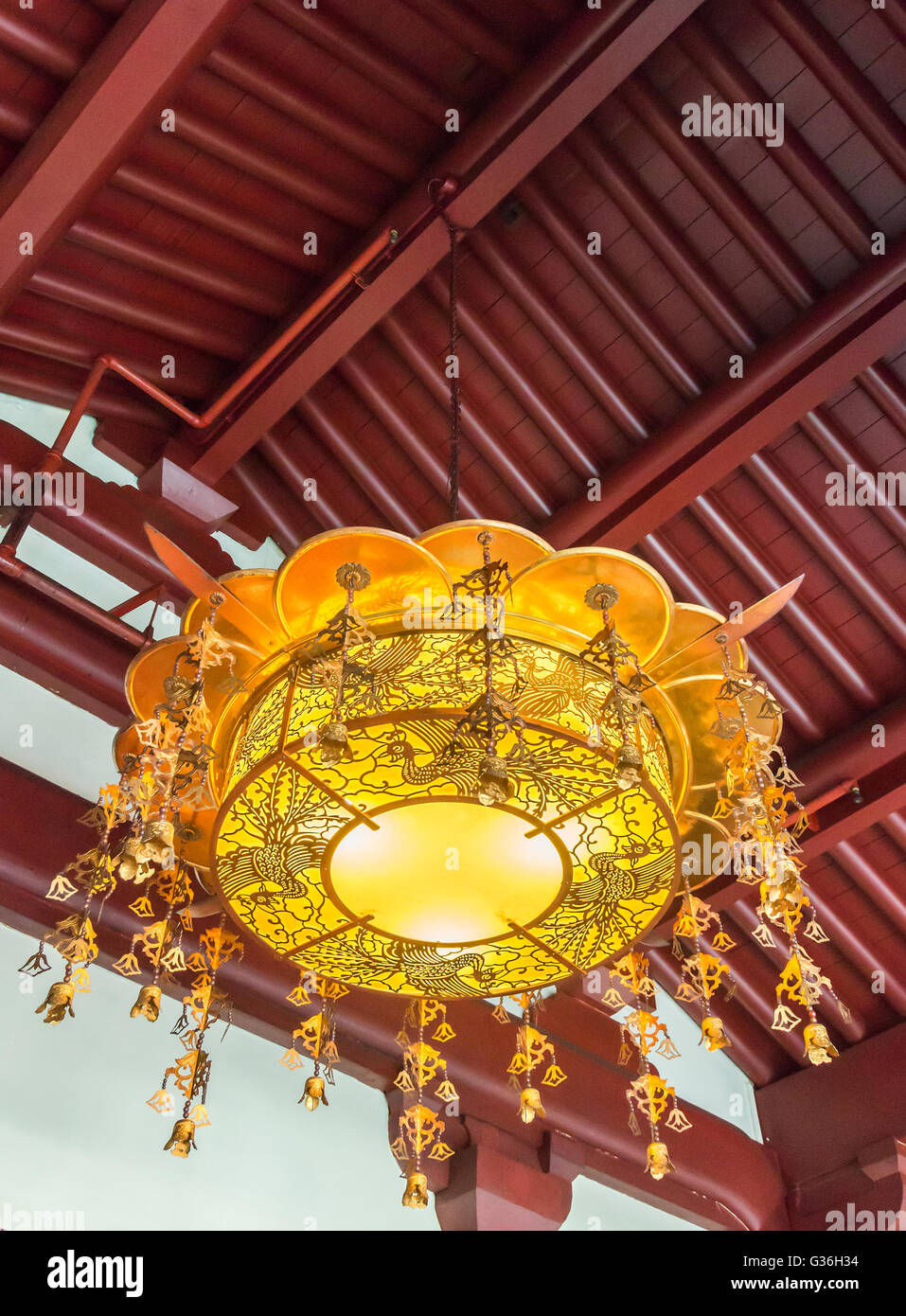 Traditional Chinese lantern is hanging on the roof of temple Stock ...