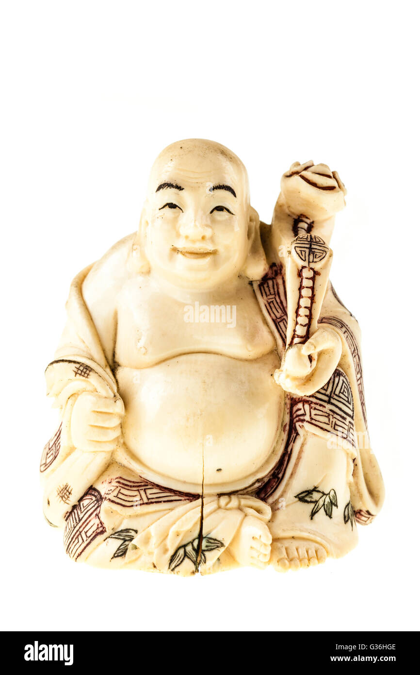 a smiling fat buddha statuette isolated over a white background Stock Photo