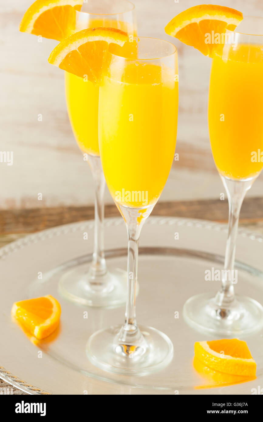 https://c8.alamy.com/comp/G36J7A/homemade-refreshing-orange-mimosa-cocktails-with-champaigne-G36J7A.jpg