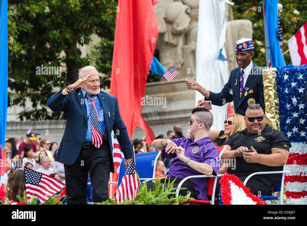 NASA Astronaut Buzz Aldrin salutes disabled veterans during The American Veterans Center National Memorial Day Parade down Pennsylvania Avenue May 30, 2016 in Washington, DC. Stock Photo