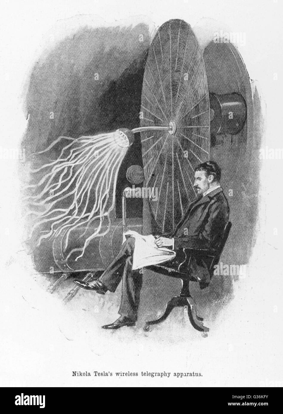 Nikola Tesla (1856-1943), Croatian inventor seated beside his wireless  telegraphy apparatus      Date: 1899 Stock Photo