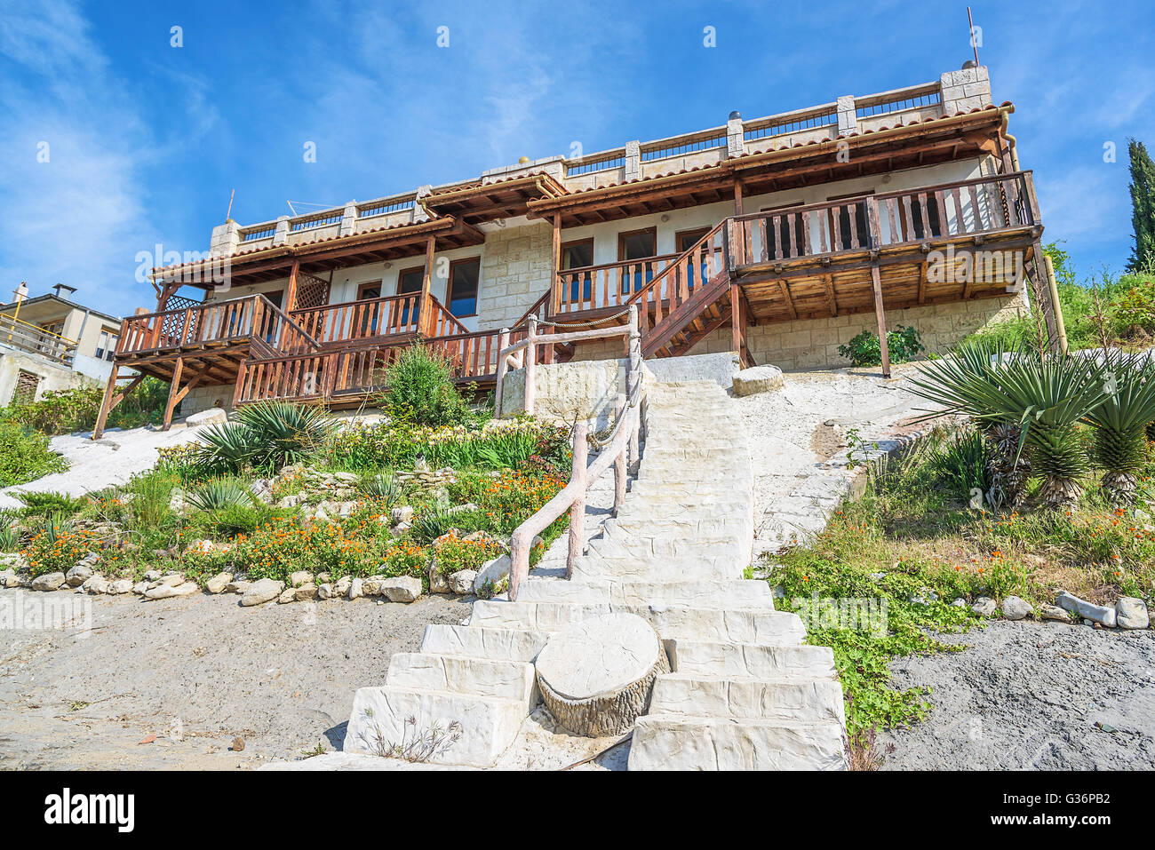 Home exterior stone steps at summer day. Stock Photo