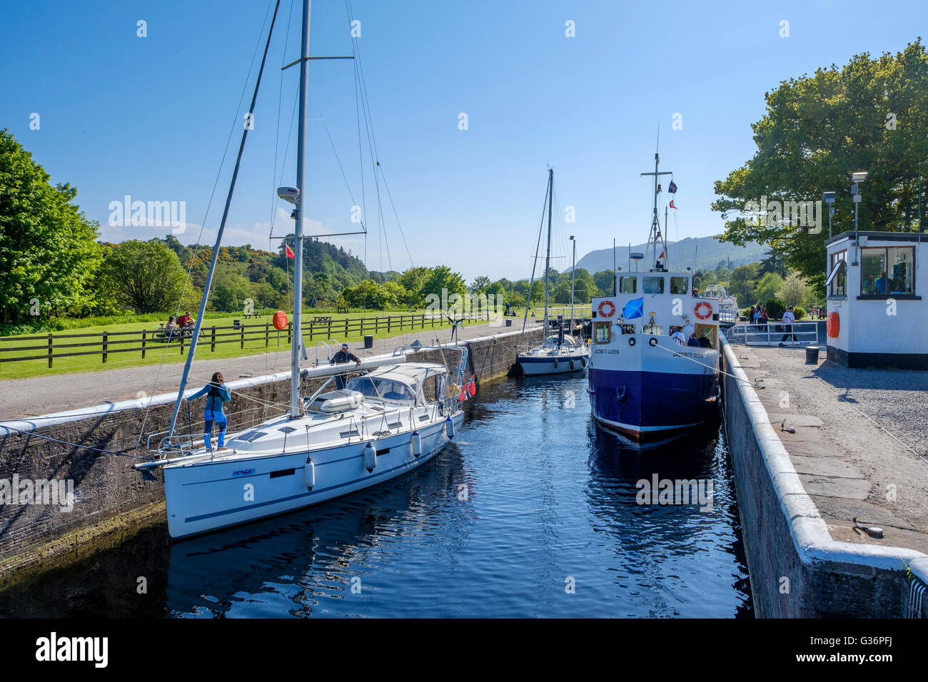 Vessels negotiating the locks on the Caledonian Canal at Dochgarroch, near Inverness Stock Photo