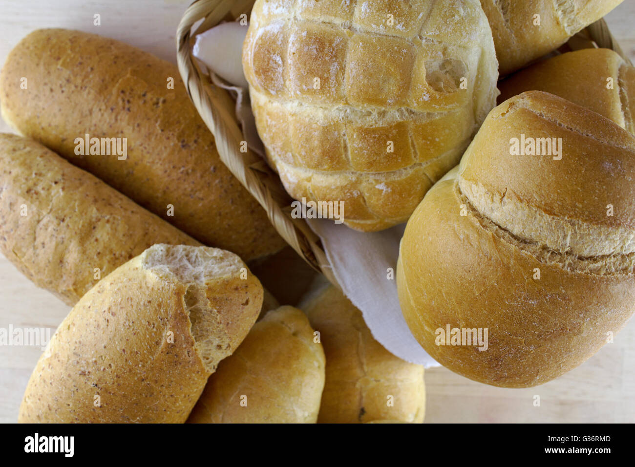 Collection of different kind of bread on wooden background, natural ...