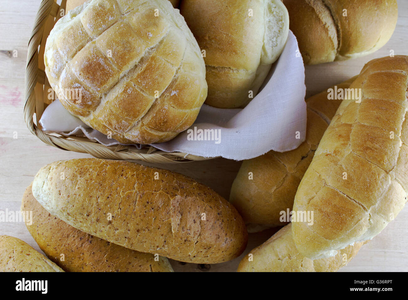 Collection of different kind of bread on wooden background, natural ...