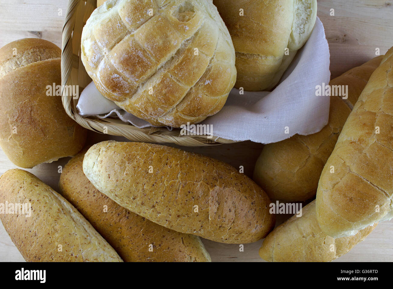 Collection of different kind of bread on wooden background, natural ...