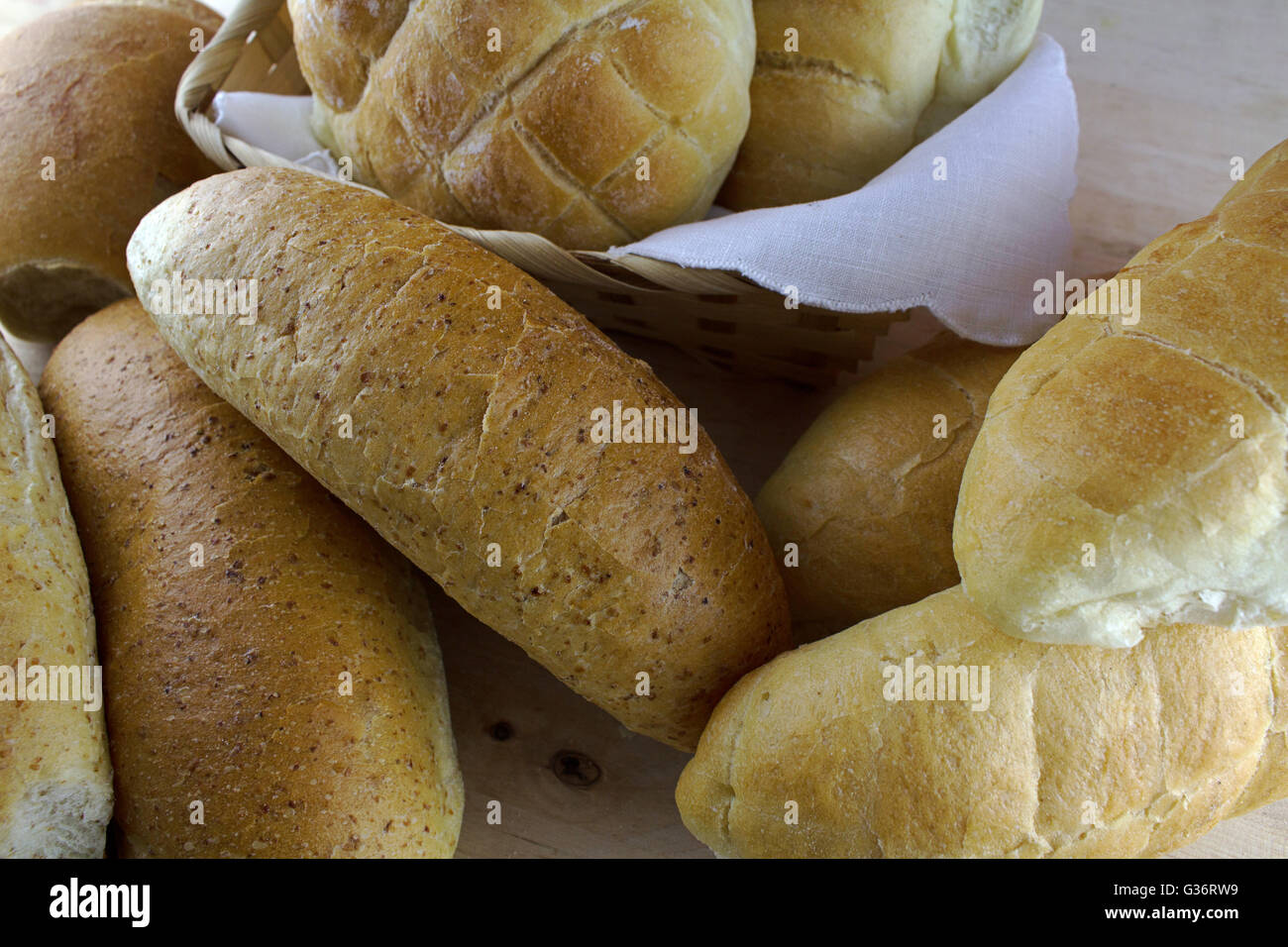 Collection of different kind of bread on wooden background, natural ...