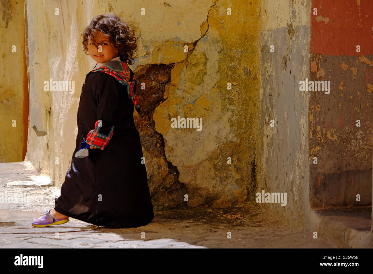 A young girl in traditional clothing, El Jadida Morocco Stock Photo