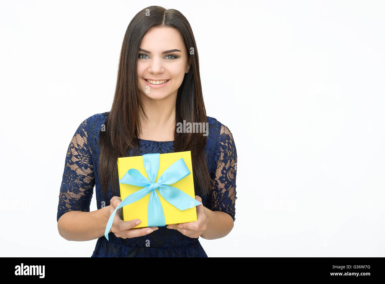 Young woman portrait holding gift Stock Photo - Alamy
