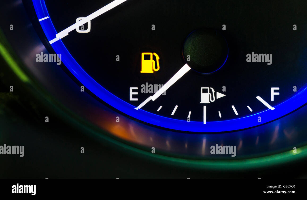 Car auto vehicle gas fuel gauge dashboard indicator with needle showing empty gas fuel tank Stock Photo