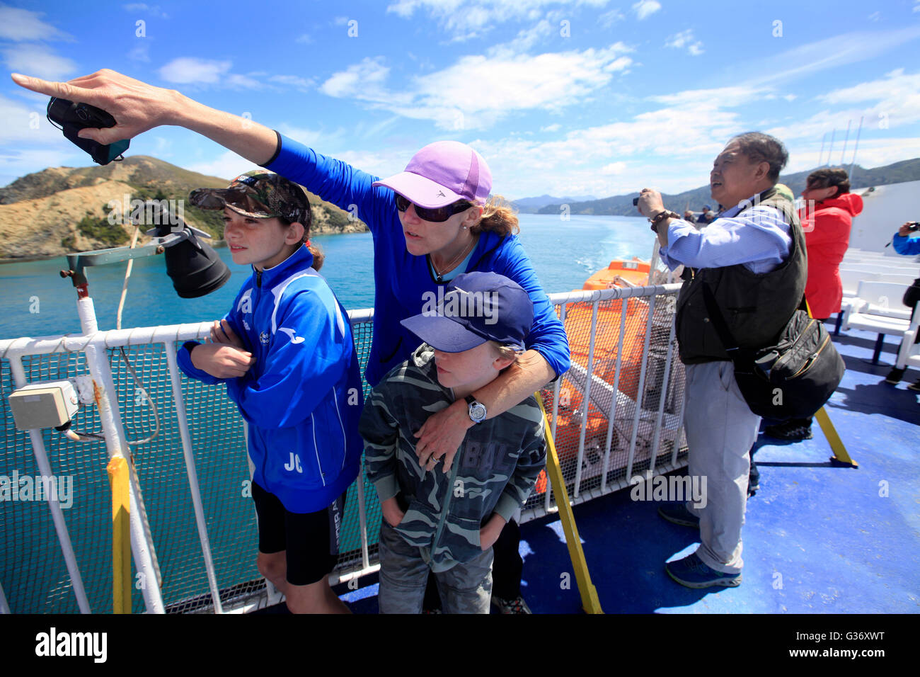 Fiona with children Jasmine and Charlie on the Cook Strait ferry Interislander from Picton to Wellington Stock Photo