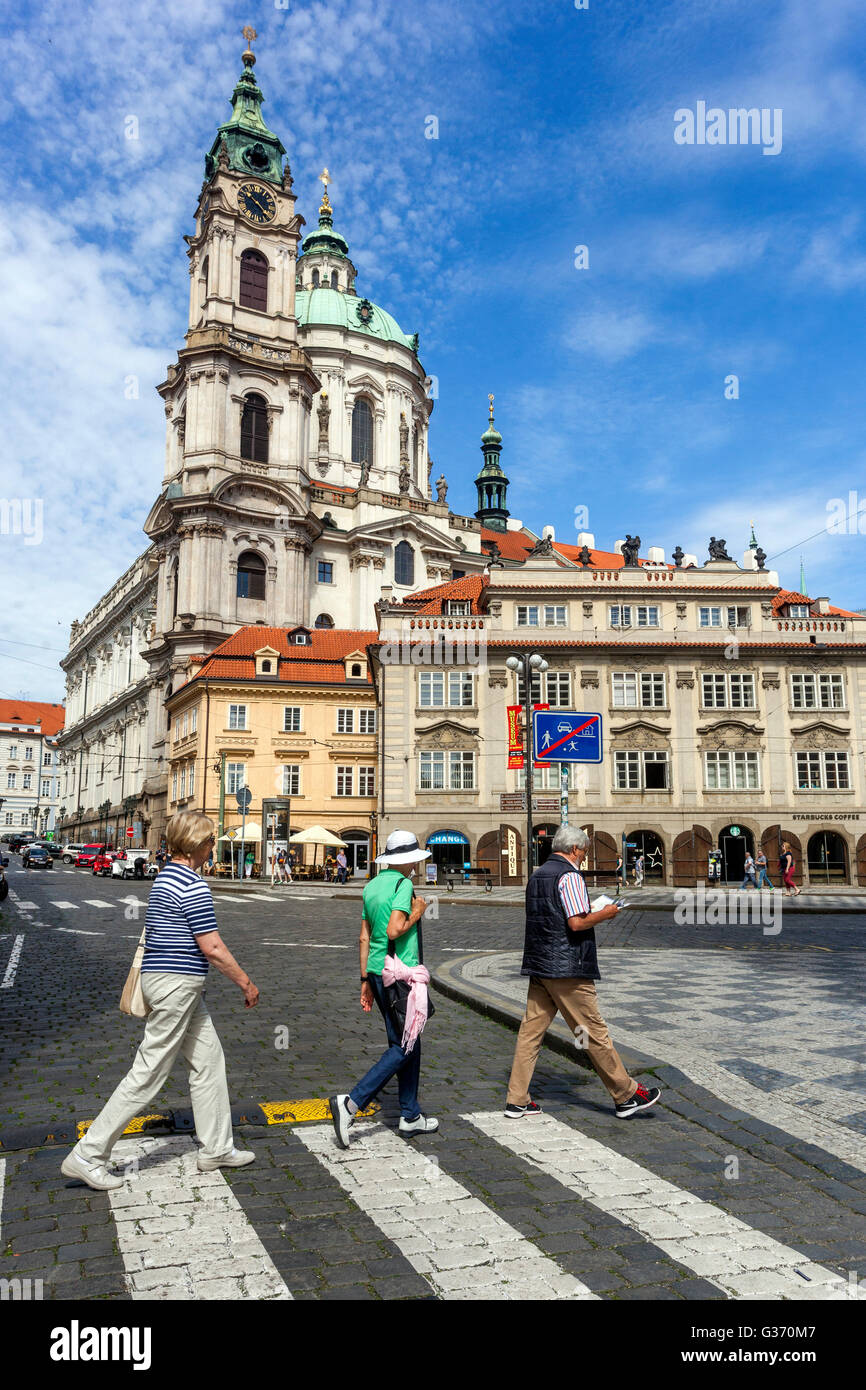 Prague Mala Strana Square, St Nicholas Church,  Lesser Town Square, People on Malostranske Square, Czech Republic Stock Photo