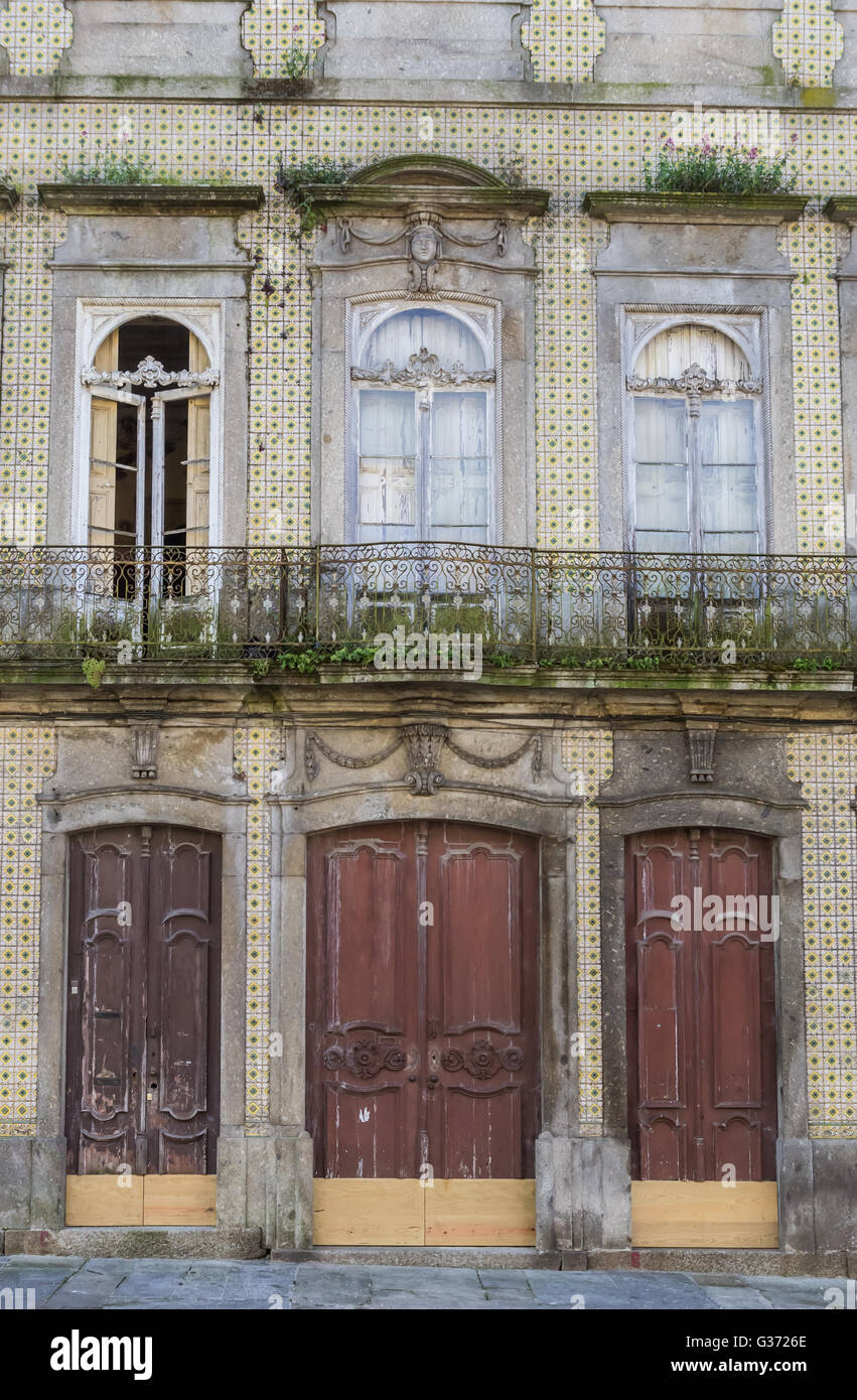 Three door of an old building in Braga, Portugal Stock Photo