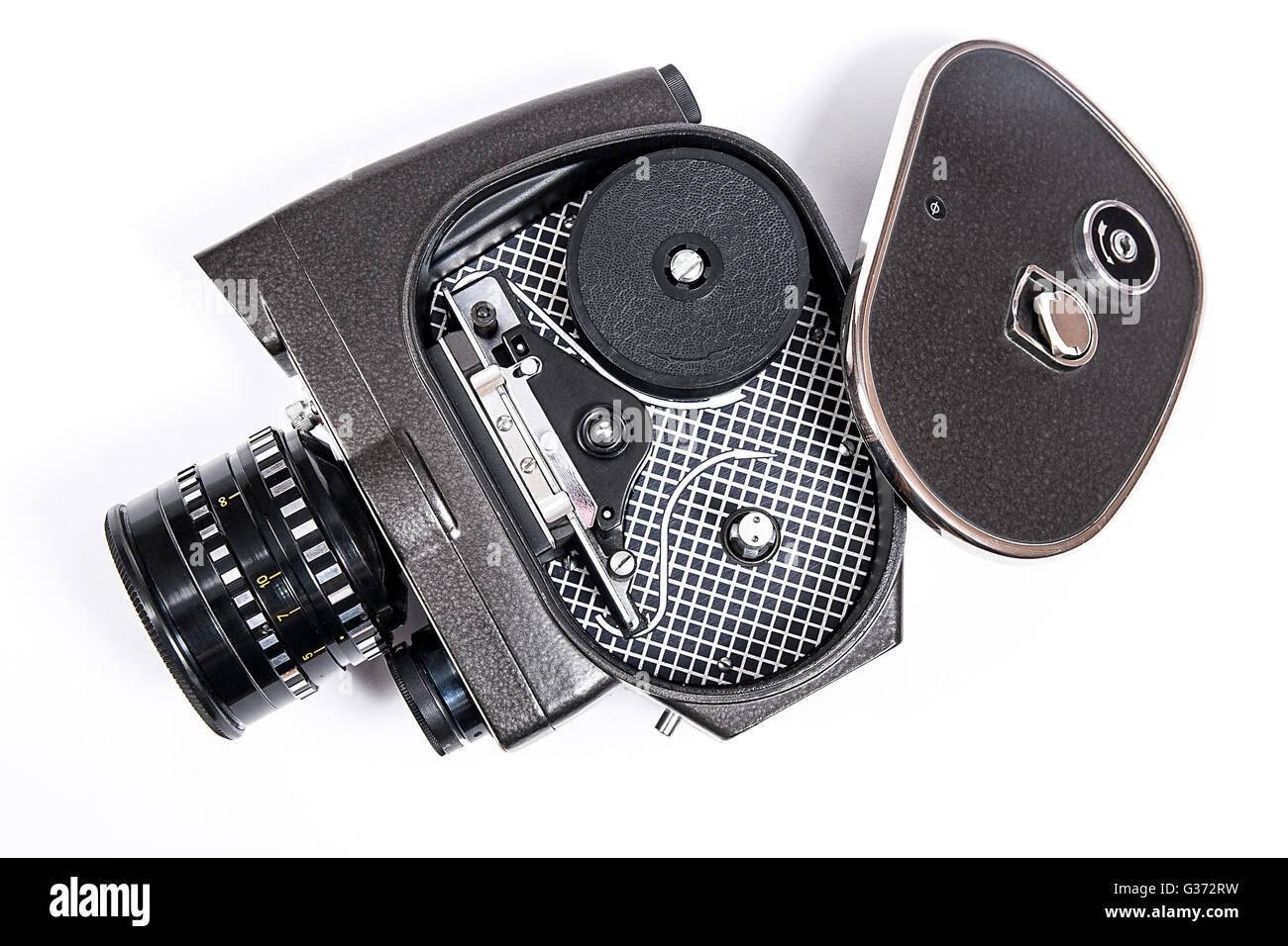 Old movie camera with lens isolated on a white background Stock Photo