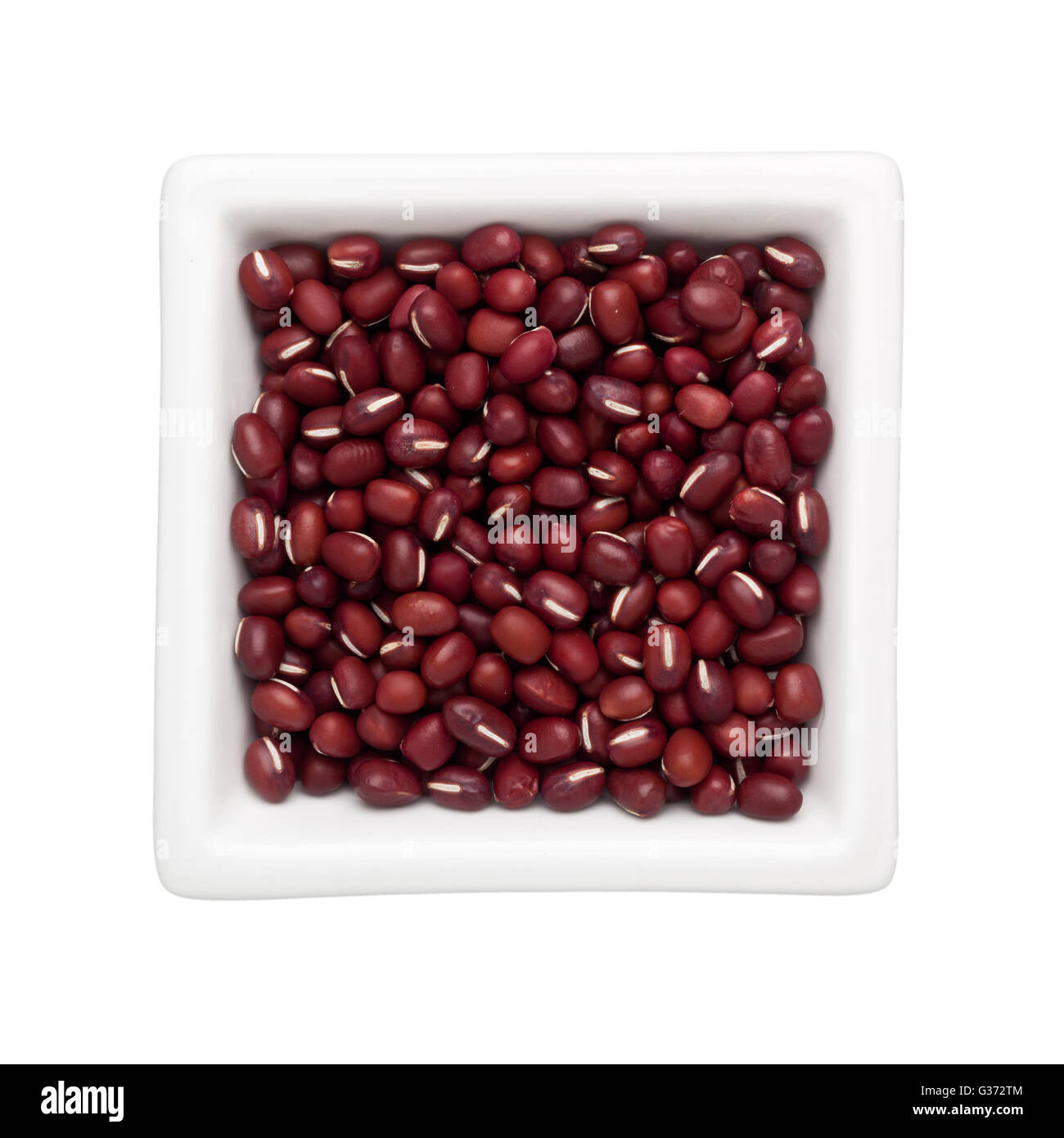 Adzuki beans in a square bowl isolated on white background Stock Photo