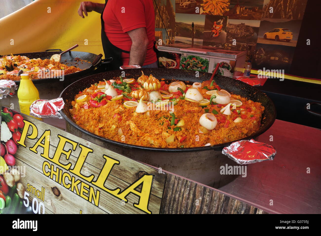 Pan cooking paella market stall hires stock photography and images Alamy