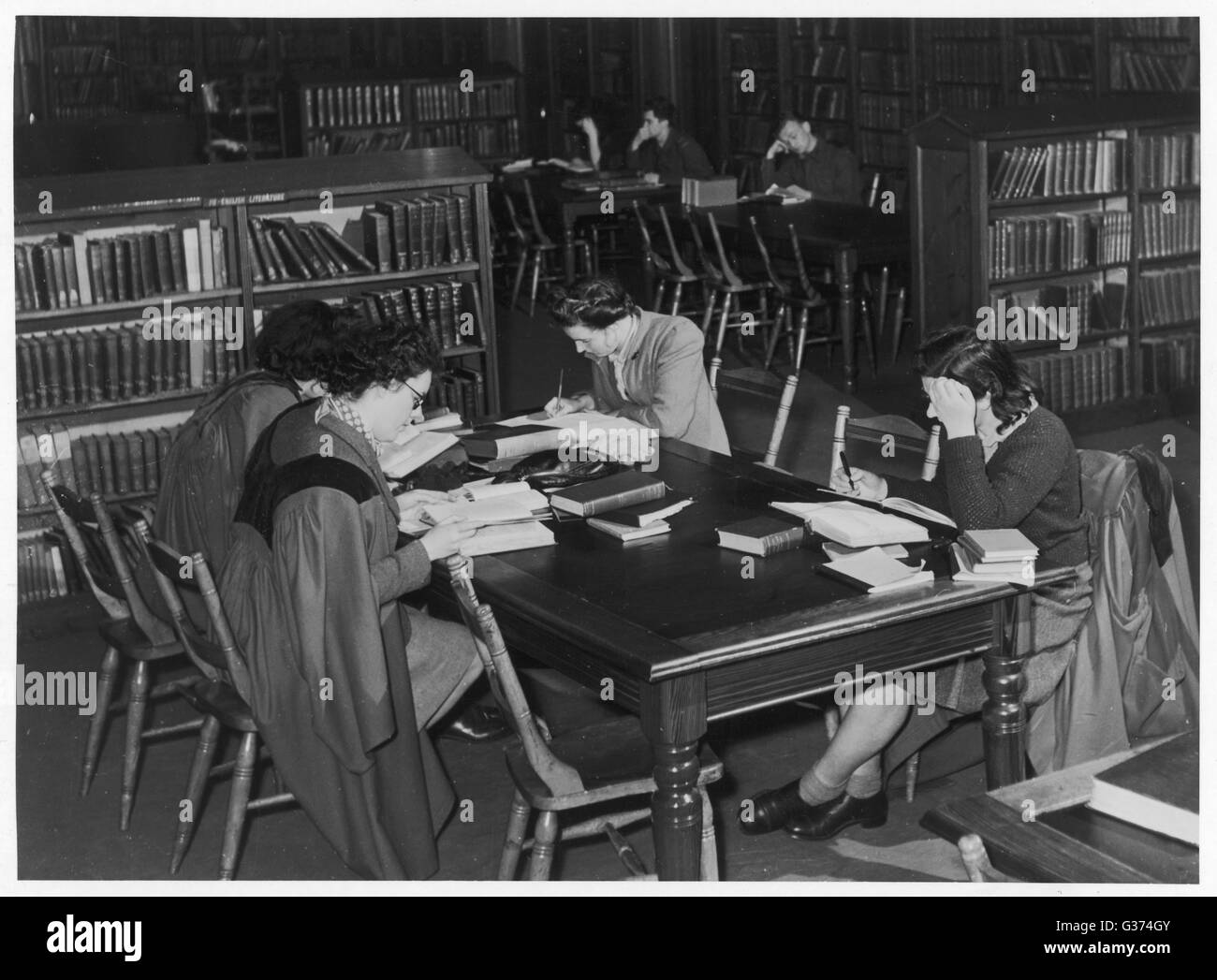 Women students at St Andrew's University reading books and making notes
