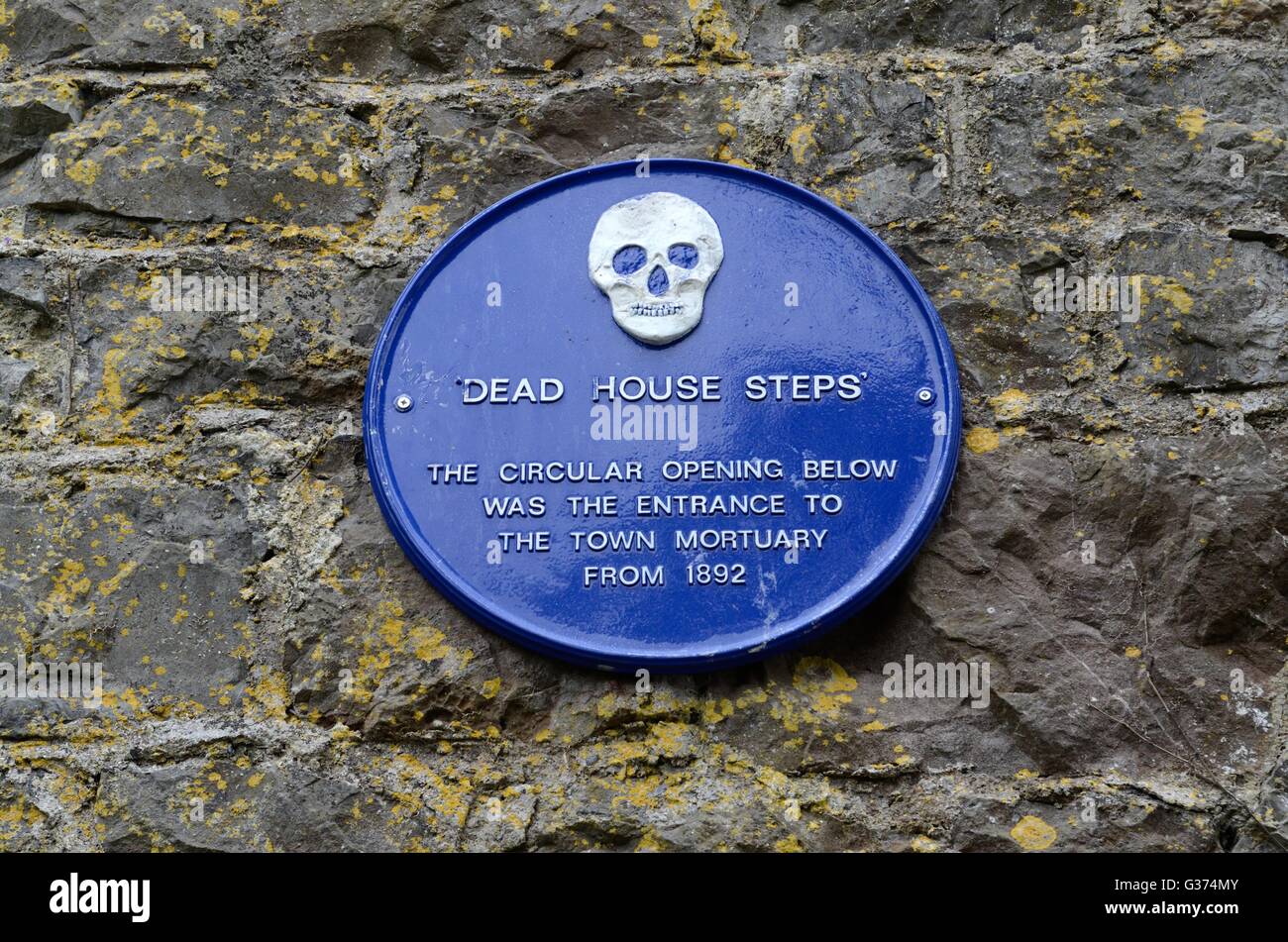 Sign on steps saying Dead House Steps near the old entrance to Tenby mortuary the 1800s Stock Photo