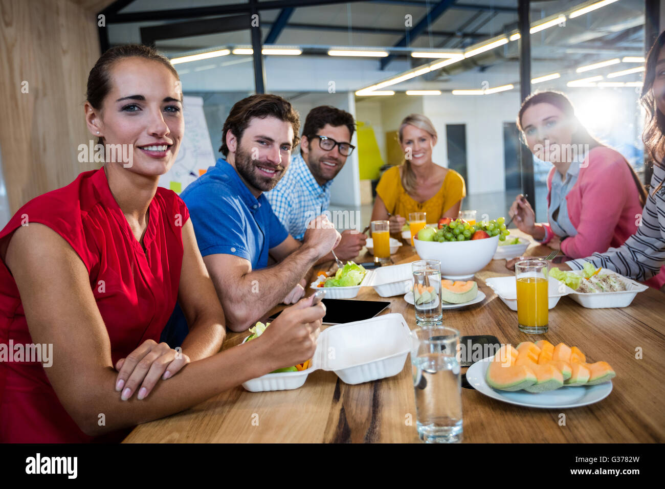 Casual business team eating together Stock Photo