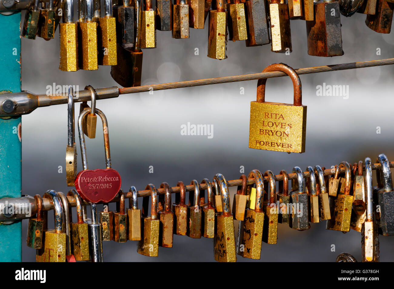 Love Locks fastened to bridge in Bakewell Peak district Derbyshire