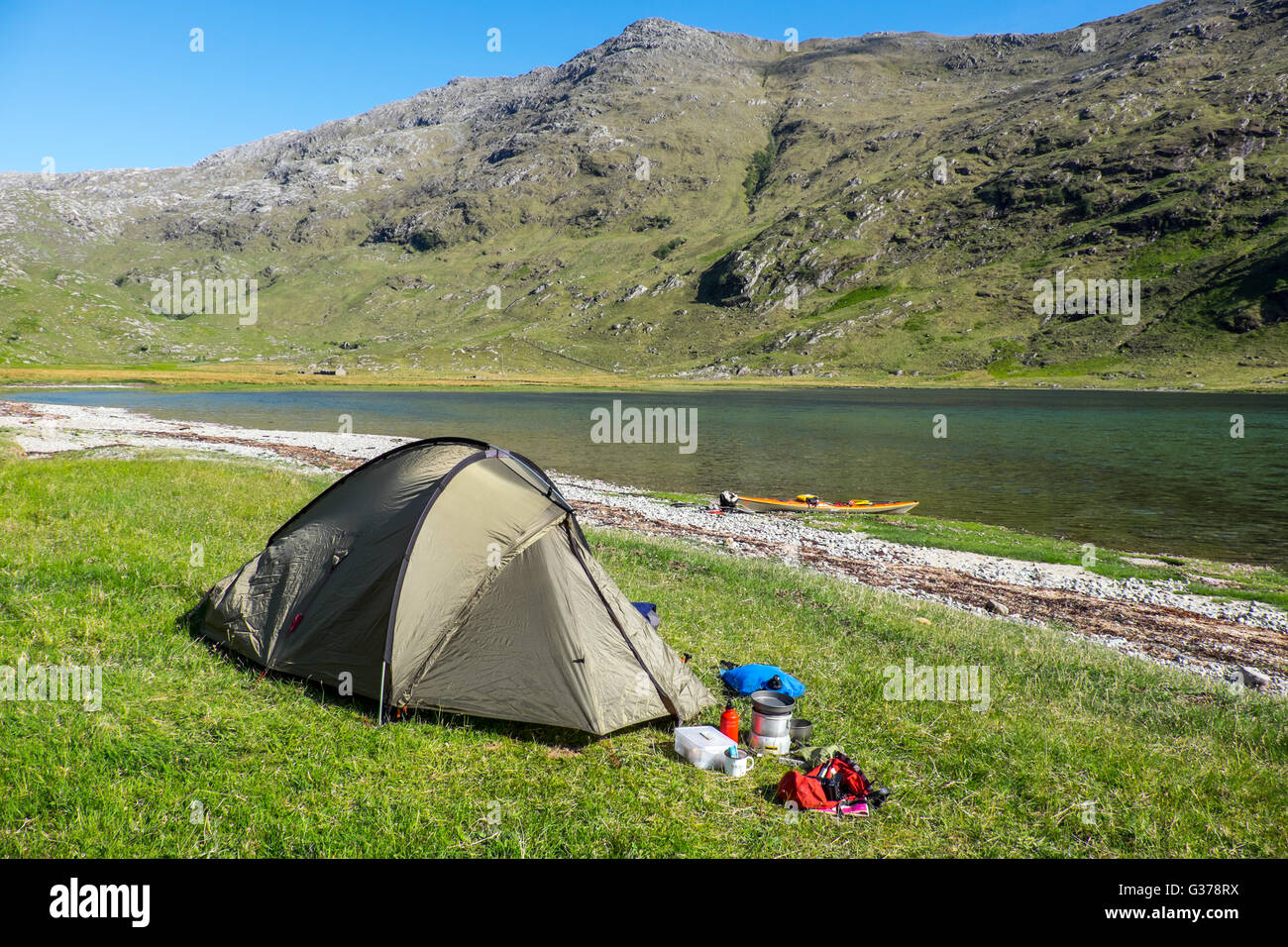 Wild camping at the head of Loch Nevis, Knoydart, Scotland as part of a sea kayaking expeditio Stock Photo