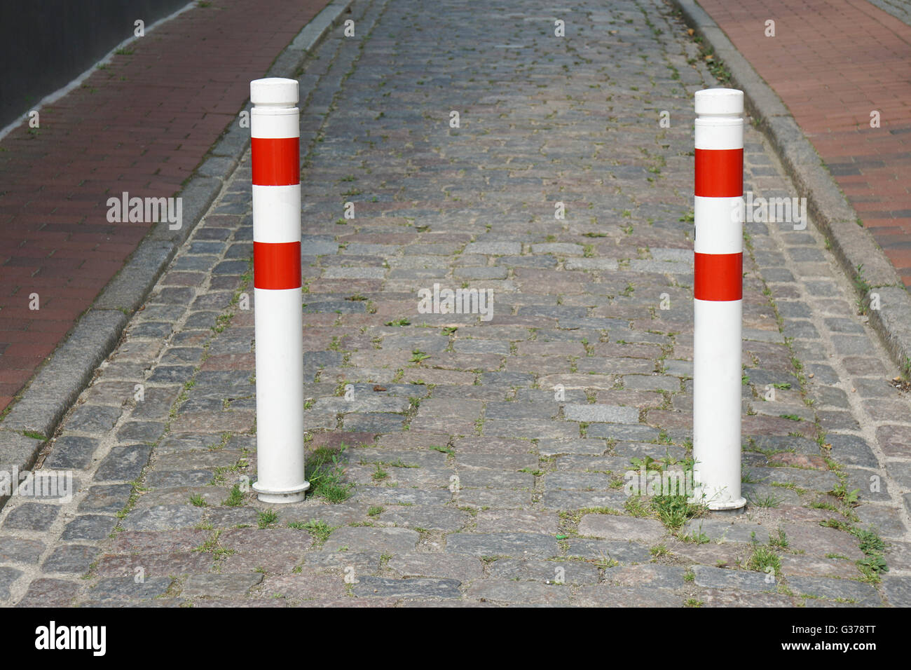 bollards on city street Stock Photo