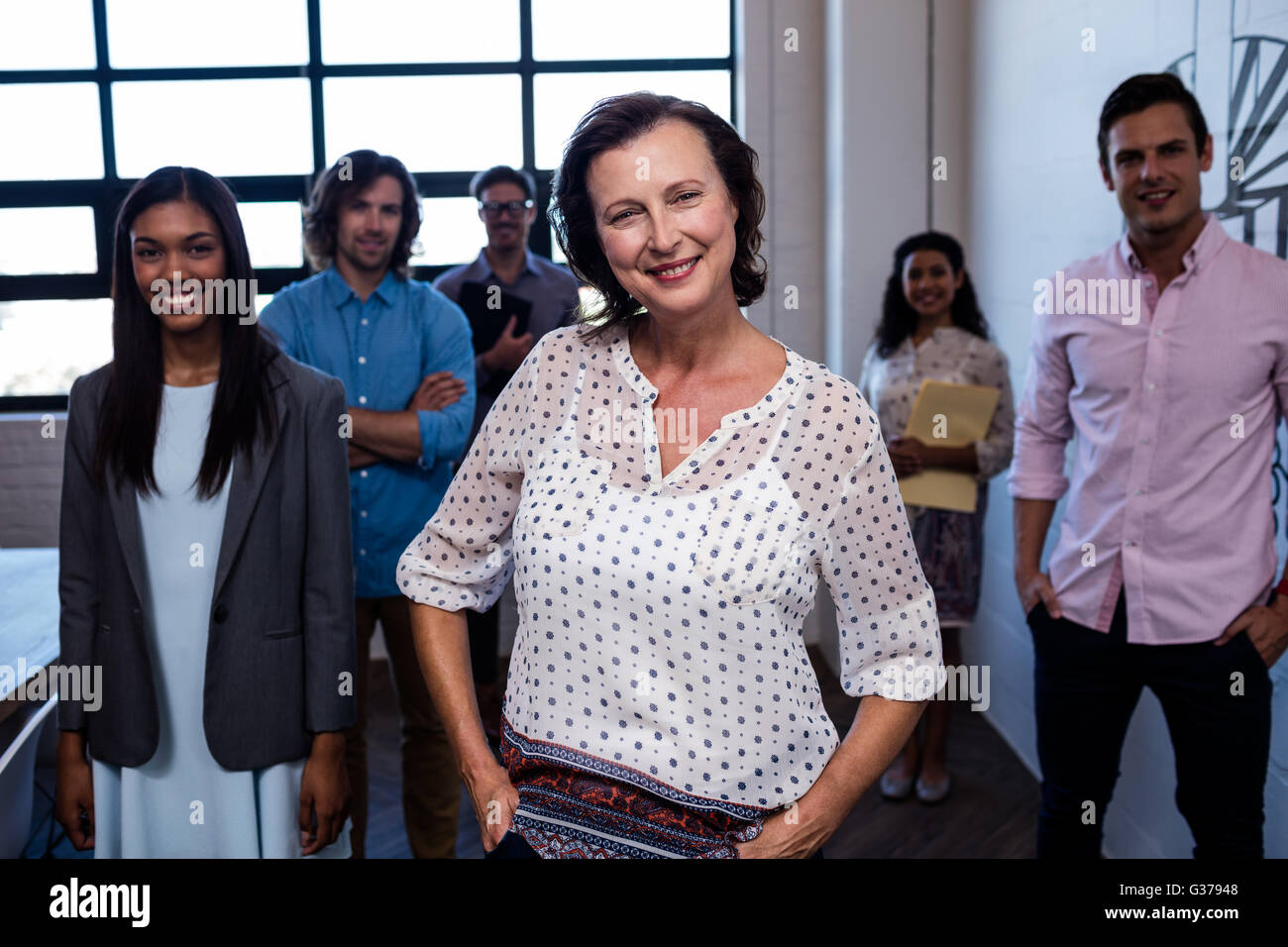 Group people posing in hi-res stock photography and images - Alamy