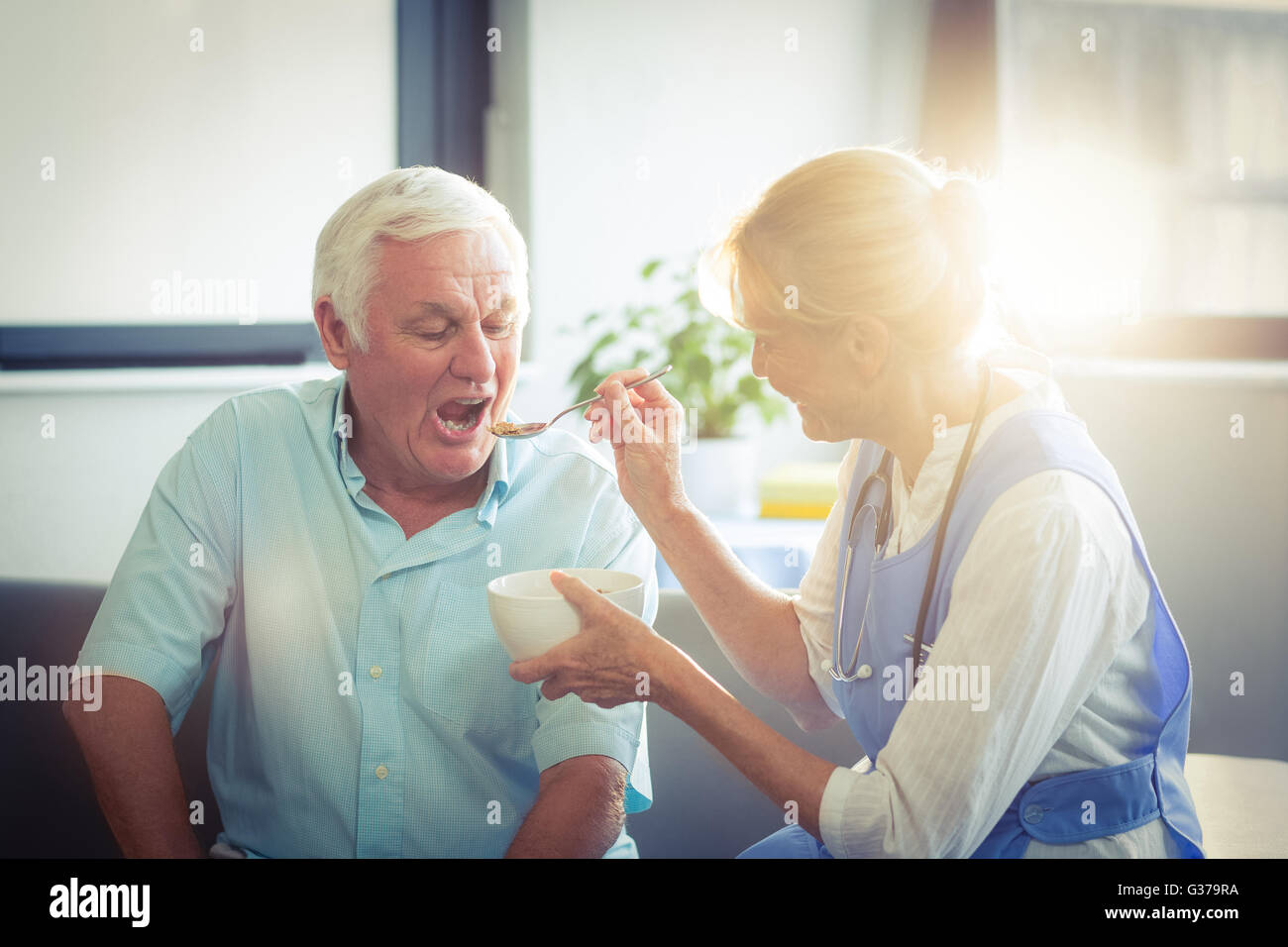 Feeding elderly patient hires stock photography and images Alamy