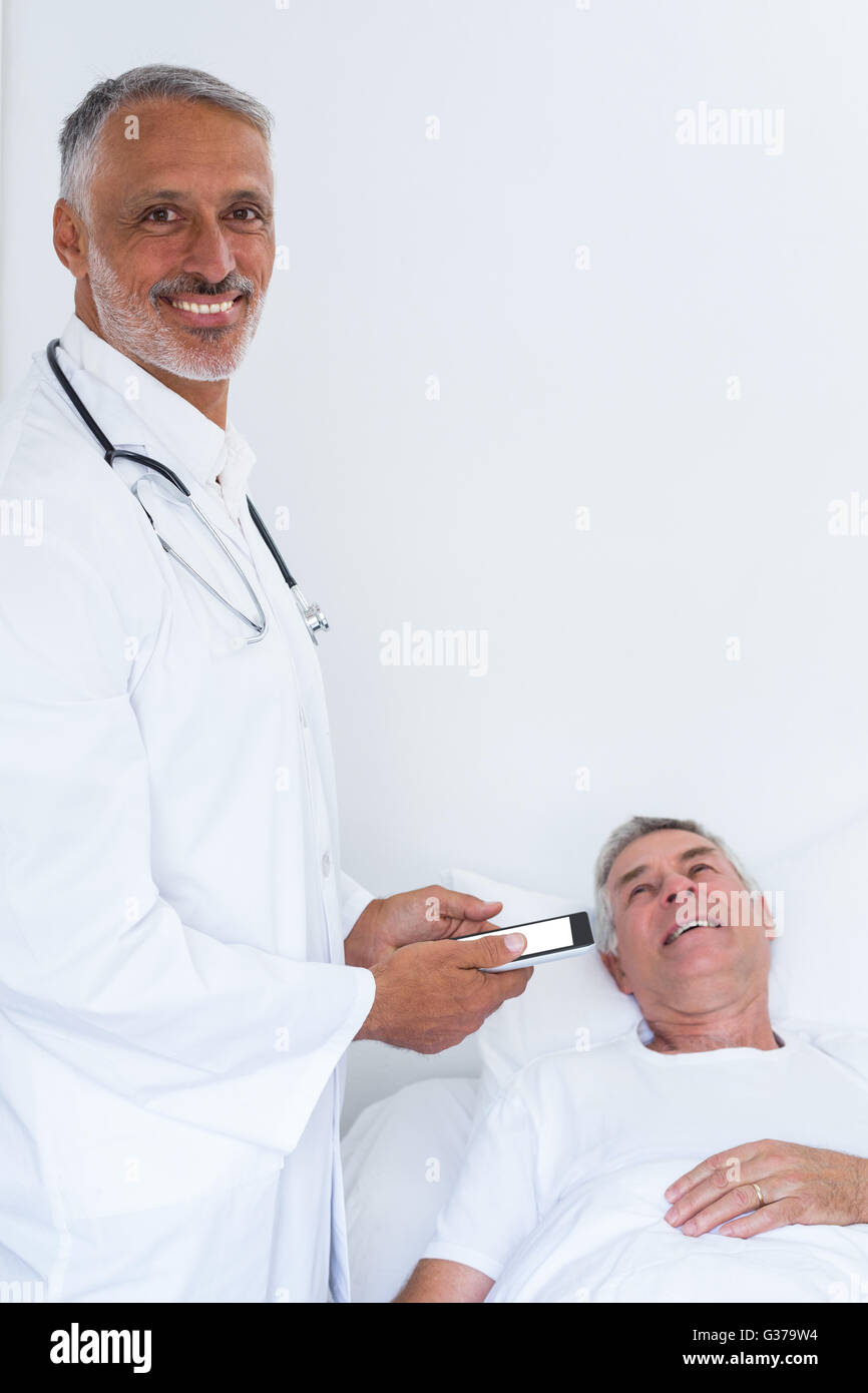 Doctor and mature male patient hi-res stock photography and images - Alamy