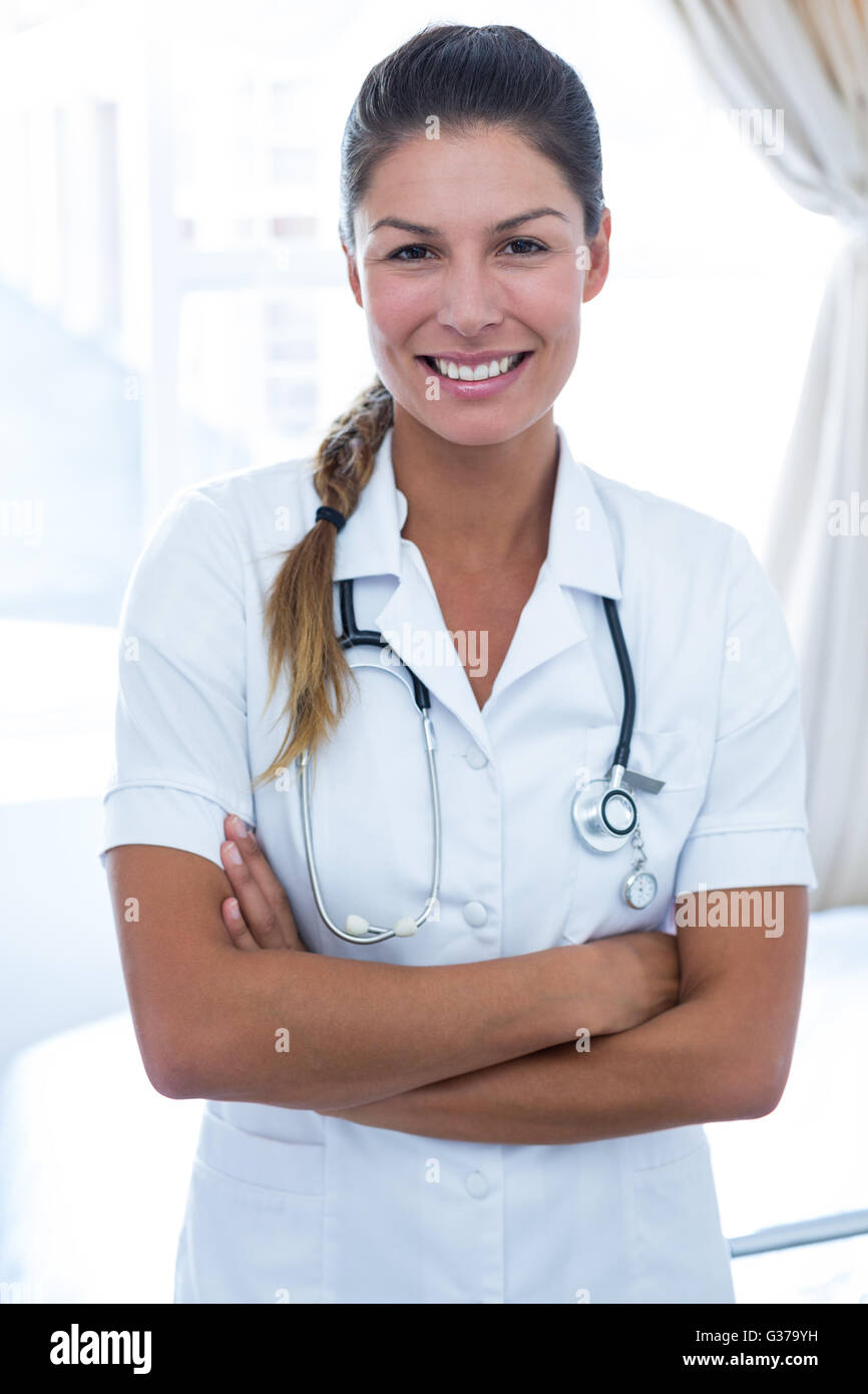 Doctor portrait arms crossed hi-res stock photography and images - Alamy