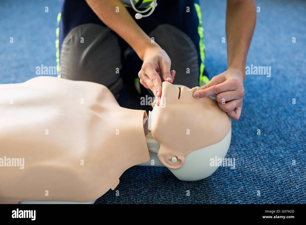 Paramedic during cardiopulmonary resuscitation training Stock Photo